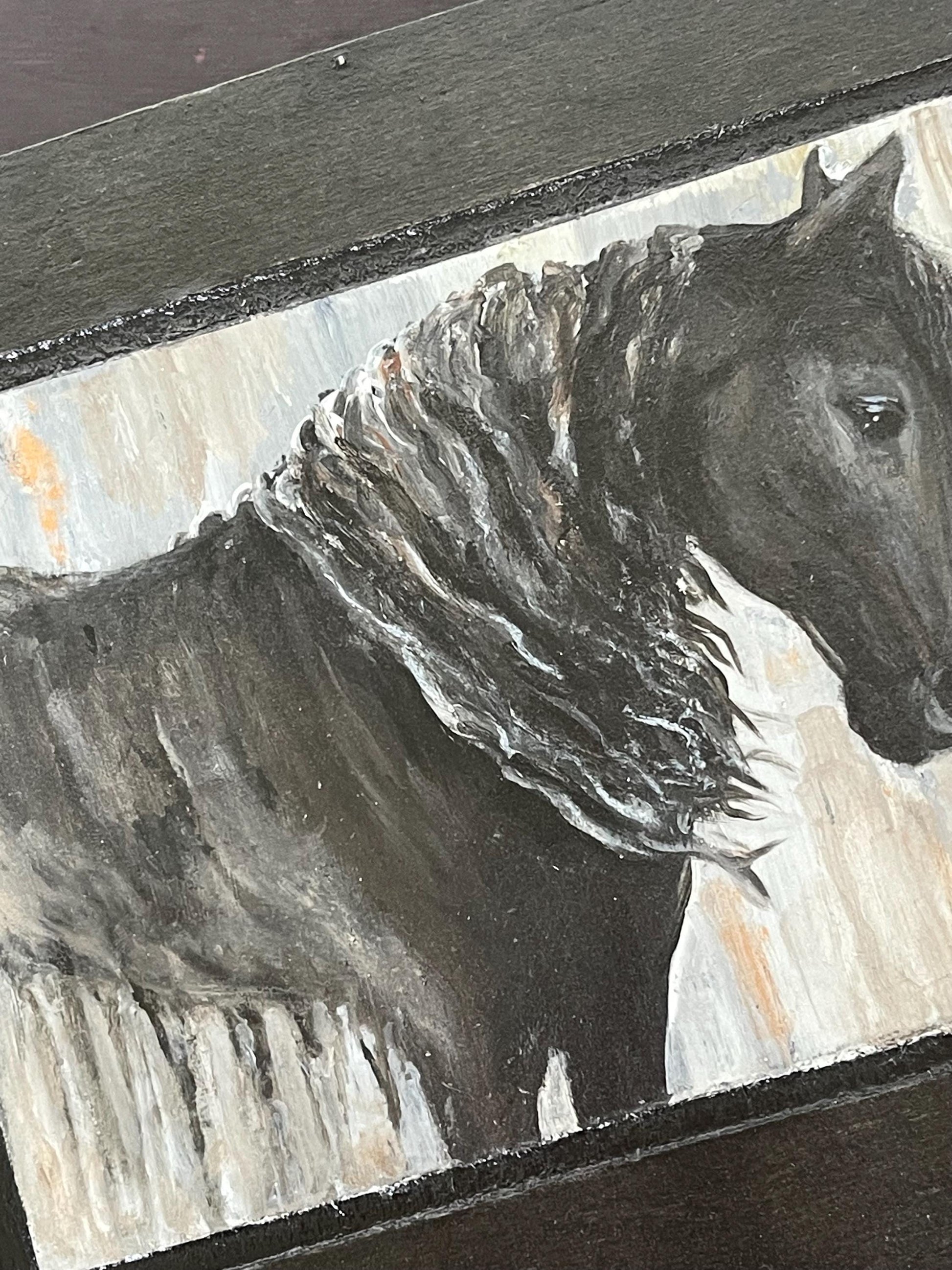 Close-up of a horse painting on a decorative upcycled box.