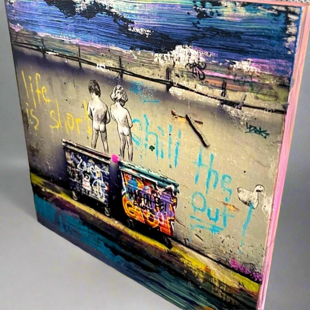 Colorful art piece with text and figures on a board